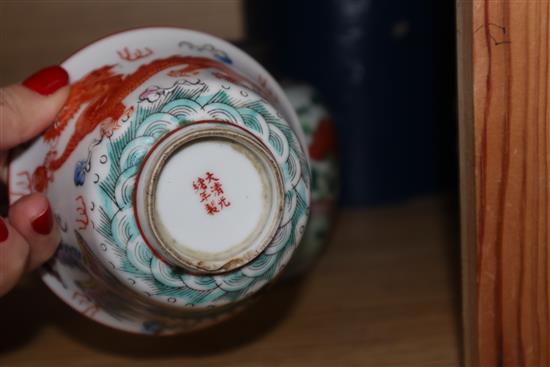 A Chinese dragon lidded tea bowl, a vase with metal cover and a stand